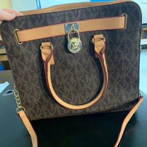 Moderately used “Michael Kors,” tote purse